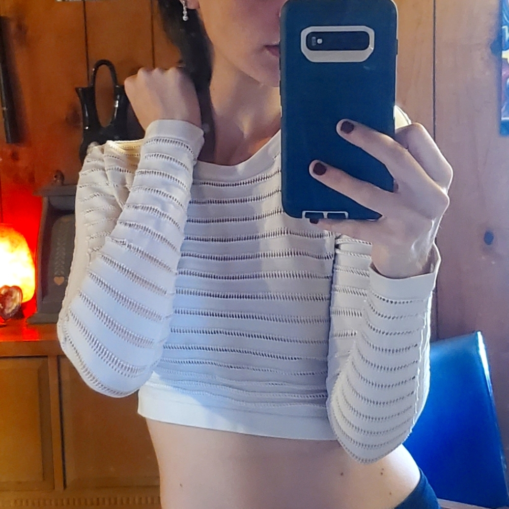 White open hole patterned long-sleeved crop top